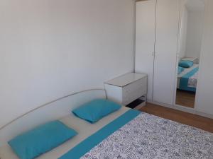Postel nebo postele na pokoji v ubytování Apartments & Rooms Tony