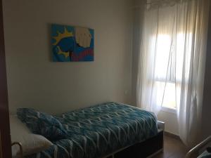 Posteľ alebo postele v izbe v ubytovaní Cabo de Gata Oasis Retamar II