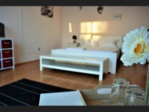 Postel nebo postele na pokoji v ubytování Casa Rendez Vous