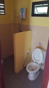 a bathroom with a white toilet in a room at Alisa room for rent in Ko Chang