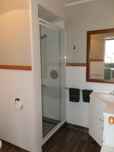 A bathroom at Timaru TOP 10 Holiday Park