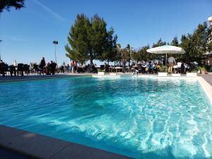 Bazén v ubytování Hotel Oaz nebo v jeho okolí