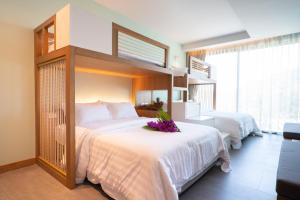Кровать или кровати в номере Anana Ecological Resort Krabi - SHA Extra Plus