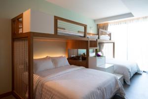 Кровать или кровати в номере Anana Ecological Resort Krabi - SHA Extra Plus
