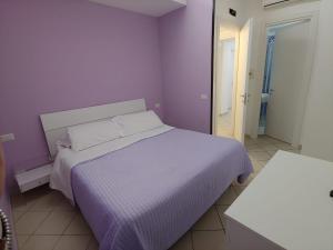 Ένα ή περισσότερα κρεβάτια σε δωμάτιο στο SORRENTO RELAIS BASEMENT