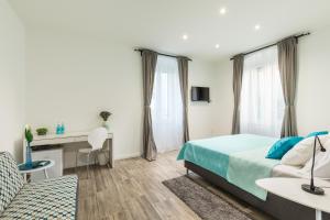 Ένα ή περισσότερα κρεβάτια σε δωμάτιο στο SeaBed Rooms2 Split
