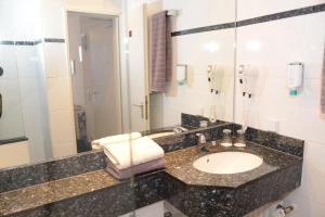 Koupelna v ubytování Hotel Granus