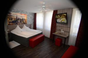 Postel nebo postele na pokoji v ubytování Hotel Granus