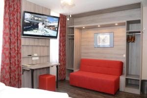 TV a/nebo společenská místnost v ubytování Hotel Granus