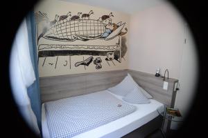 Postel nebo postele na pokoji v ubytování Hotel Granus