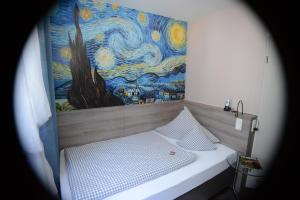 Postel nebo postele na pokoji v ubytování Hotel Granus