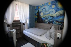 Postel nebo postele na pokoji v ubytování Hotel Granus