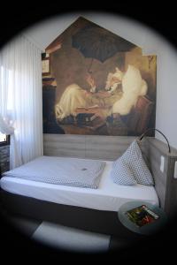 Postel nebo postele na pokoji v ubytování Hotel Granus