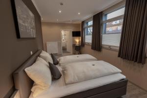Postel nebo postele na pokoji v ubytování Mey Hotel + 34 fotografií