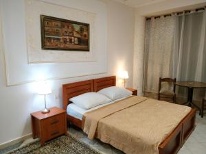 Postel nebo postele na pokoji v ubytování Hotel Rothschild 37