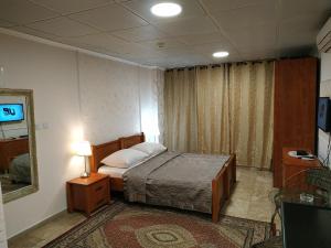 Postel nebo postele na pokoji v ubytování Hotel Rothschild 37