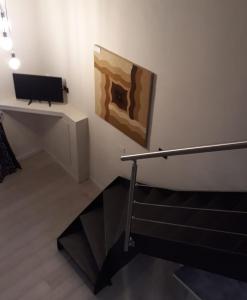 TV a/nebo společenská místnost v ubytování Luxory Loft