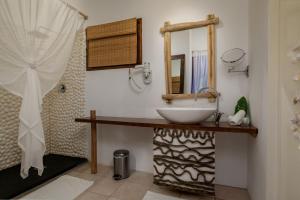 Kopalnica v nastanitvi Bliss Hotel Praslin