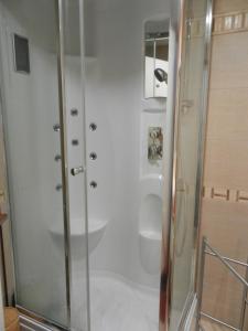 a bathroom with a shower and a toilet at luxury lisbon apartment T2 in Lisbon