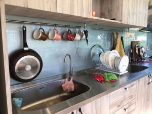 Una cocina o cocineta en Futian B&B 32 fotos más