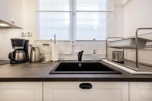 A kitchen or kitchenette at Acropolis Exceptional View