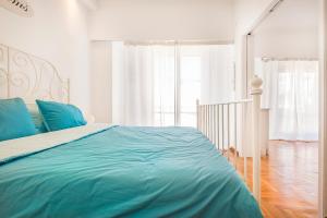 A bed or beds in a room at Acropolis Exceptional View