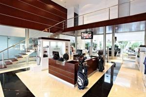 a room with a motor bike on a counter at Bahia Principe & Golf Residences (Terrazas Condo) in Tulum