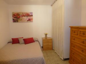 A bed or beds in a room at Casa Paco