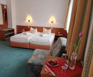 Кровать или кровати в номере Garni-Hotel Alt Wernigeröder Hof