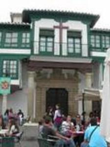 a group of people standing in front of a building at Casa De Comedias in Almagro