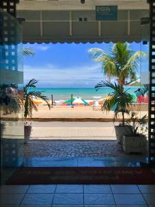 a view of the beach from a building at Pousada America do Sol in Natal