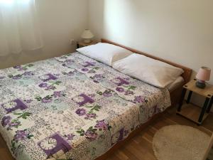 Ein Bett oder Betten in einem Zimmer der Unterkunft Croatian Home Apartments