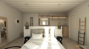a living room with a bed and a table at Apiro Mykonos in Mýkonos City
