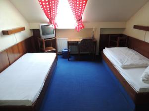 Postel nebo postele na pokoji v ubytování Hotel Am Flughafen