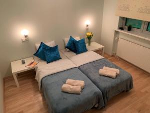 Ein Bett oder Betten in einem Zimmer der Unterkunft Ilmarine Apartment