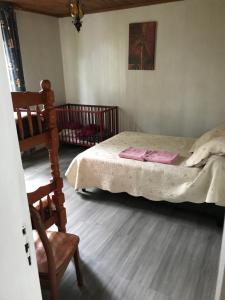 Postel nebo postele na pokoji v ubytování Le Guétali
