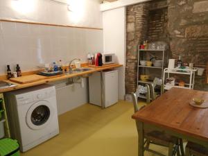 Kuchyňa alebo kuchynka v ubytovaní Mayor 17 Apartamento 2