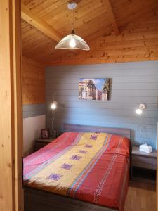 A bed or beds in a room at Casa Del Torrente
