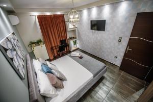 Posteľ alebo postele v izbe v ubytovaní One of a kind Luxury Apartment in City Center Near HELEXPO