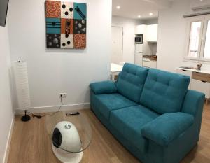 A seating area at Apartamentos Catedral Escalinata