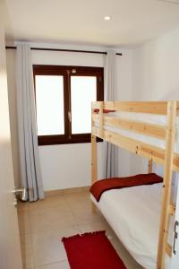 Postel nebo postele na pokoji v ubytování Bagari Apartments Camp de Mar