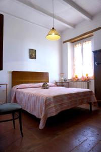 Ένα ή περισσότερα κρεβάτια σε δωμάτιο στο A casa di Stella