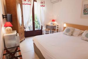 Postel nebo postele na pokoji v ubytování Motel Cap Sol