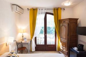 Postel nebo postele na pokoji v ubytování Motel Cap Sol