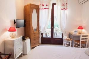 Postel nebo postele na pokoji v ubytování Motel Cap Sol