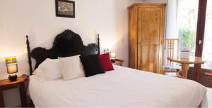 Postel nebo postele na pokoji v ubytování Motel Cap Sol