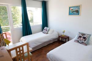 Postel nebo postele na pokoji v ubytování Motel Cap Sol
