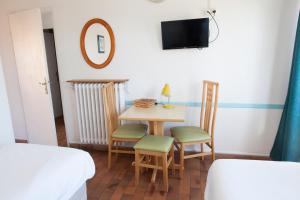 Postel nebo postele na pokoji v ubytování Motel Cap Sol