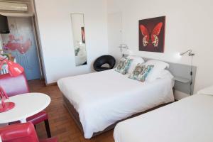 Postel nebo postele na pokoji v ubytování Motel Cap Sol