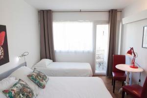 Postel nebo postele na pokoji v ubytování Motel Cap Sol